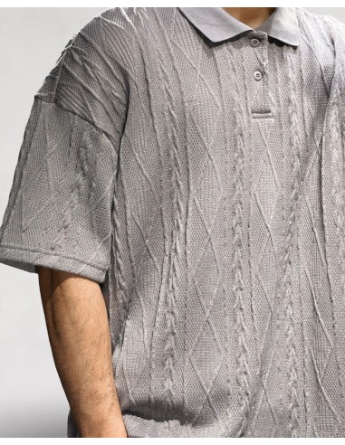 Polo gris foncé en maille géométrique