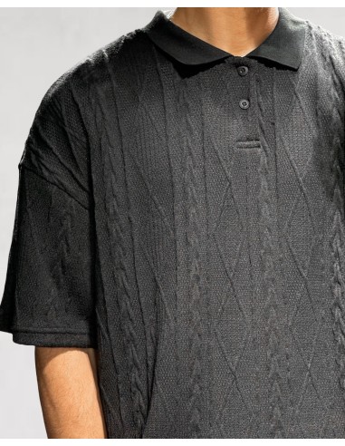Polo noir en maille géométrique