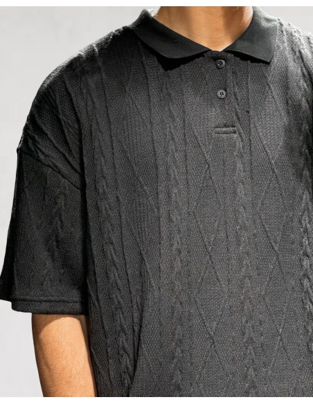 Polo noir en maille géométrique