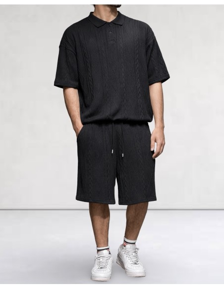 Polo noir en maille géométrique